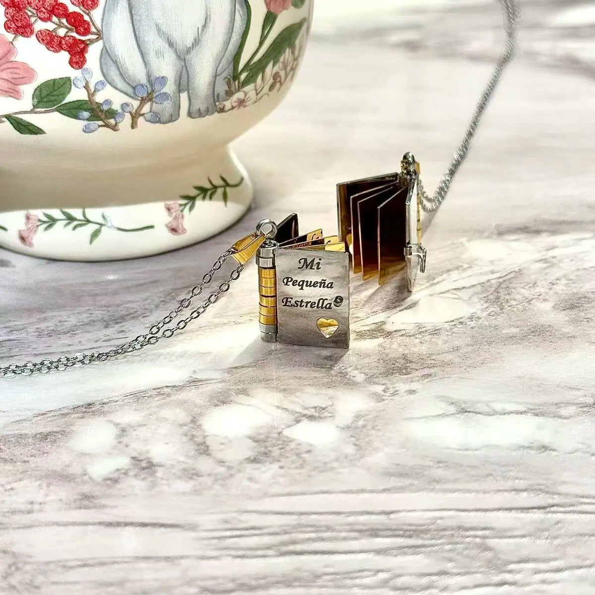 Best Mom Ever Book Necklace—the perfect gift choice for Mother's Day. Featuring a charming book-style design, it is meticulously crafted from rust-resistant 316 titanium steel—an ideal gift for Mom, a daughter, a son, or a loved one.